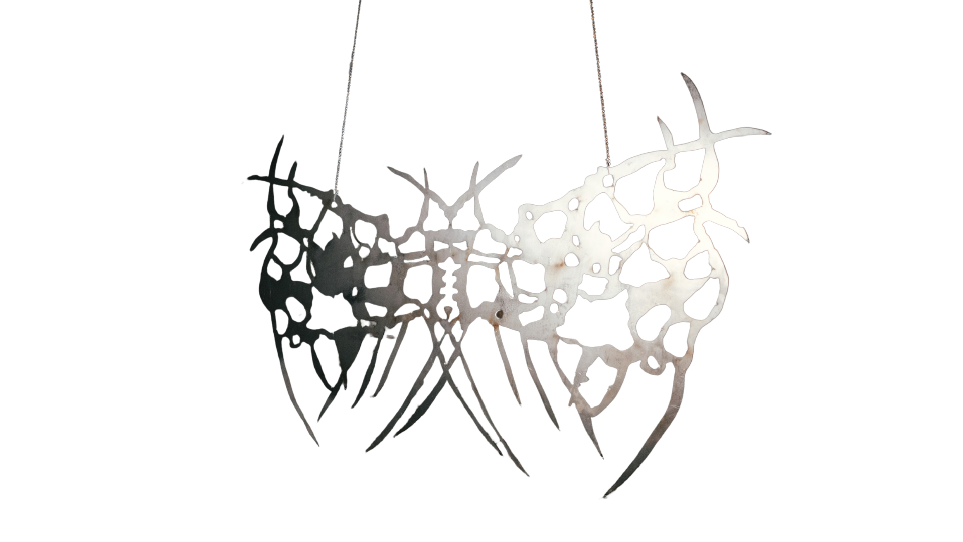 Suspended abstract sculpture with branching, interconnected organic forms against a white background.